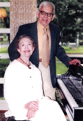 Ruth and Saul Towers at her piano.